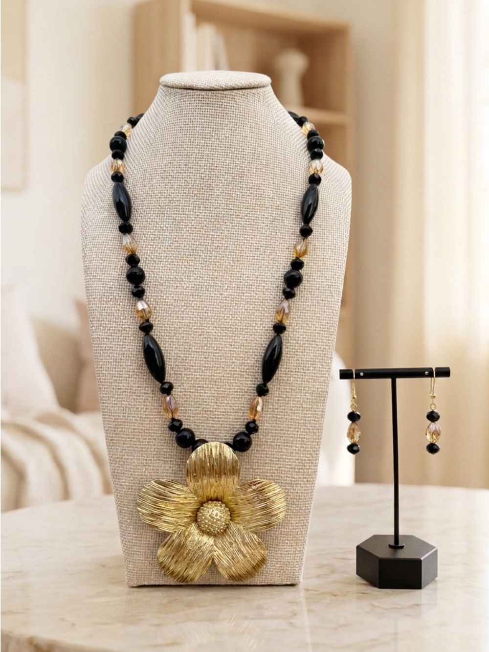 Elegant Gold Flower and Black Glass Necklace and Earring Set